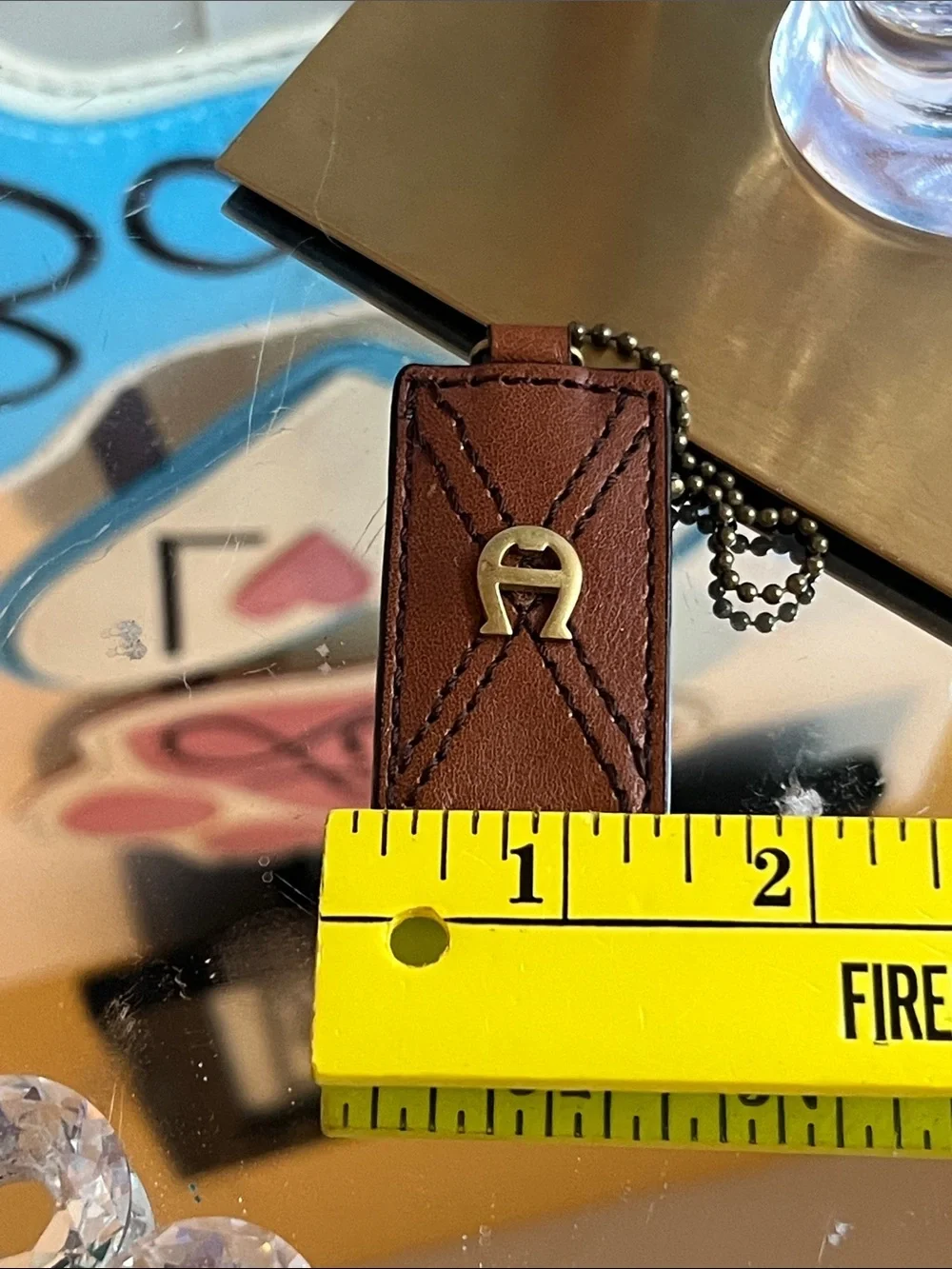 Etienne Aigner vintage  brown leather and brass logo hangtag keychain